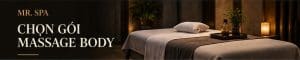 Ảnh minh họa giường massage với khăn phủ, đồ dùng gọn gàng và ánh sáng ấm.