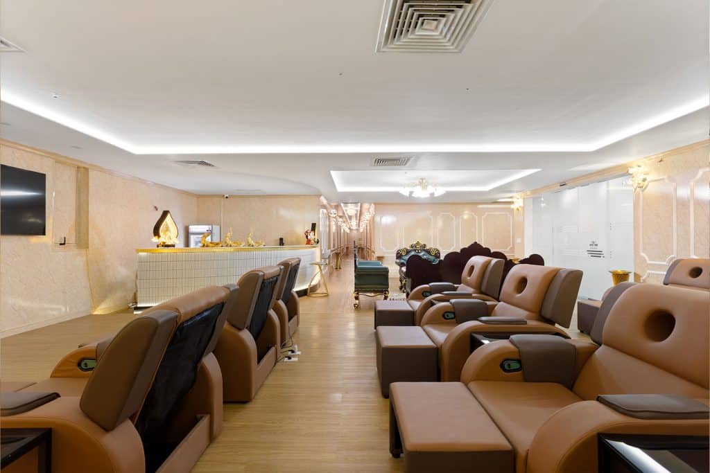 Reception counter and rows of brown reclining chairs at Mr Spa, 64 Bach Dang, Hanoi.
